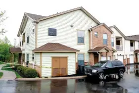  ?? THE ASSOCIATED PRESS ?? On Sunday, police tape marks the apartment building reported to be where Travis Reinking lives in Nashville. Police say Reinking is the suspect in a shooting at a Waffle House restaurant Sunday in Nashville