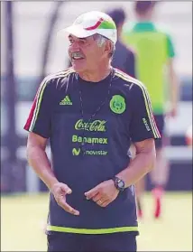  ?? Christian Palma Associated Press ?? RICARDO FERRETTI has coached Mexico’s national team since August. He will return to Tigres of the Mexican league.