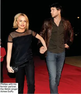  ?? ?? Phillips with his former partner, the Welsh singer Aimee Duffy