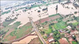  ??  ?? An aerial view of the flood-affected area due to heavy rainfall and overflow of Parvati river in Shivpuri on Tuesday.