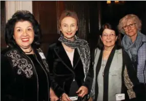  ??  ?? Susan Cohen of Berwyn and Helga Habfass of Narberth head to their seats with Minda Borun of Wynnewood and Sandy Gargus of Strafford.