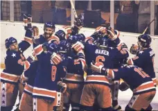  ?? JYM WILSON, USA TODAY SPORTS ?? The USA’s “Miracle on Ice” hockey team that won gold in the 1980 Olympics was composed of amateur players.