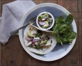  ?? LAURA AGRA (VIA AP) ?? This 2016 photo shows flaky fish tacos in New York. This dish is from a recipe by Katie Workman.