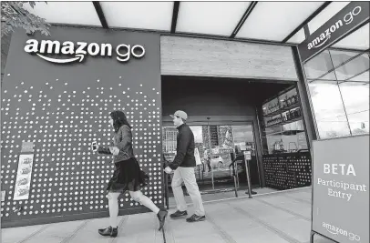  ?? [ELAINE THOMPSON/THE ASSOCIATED PRESS] ?? Although online orders of groceries are expected to grow, physical stores are not going away, analysts say.