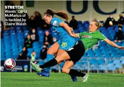  ??  ?? STRETCH: Waves’ Carla McManus of is tackled by Claire Walsh