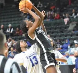  ?? KYLE FRANKO/ TRENTONIAN PHOTO ?? Pennington’s Morgan Matthews, right, puts up a shot as Ewing’s Te’Yala Delfosse, left, defends during a Mercer County Tournament semifinal girls basketball game at CURE Insurance Arena in Trenton last season.