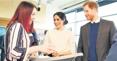  ??  ?? Sinead Murphy from Shnuggle shows Prince Harry and Meghan Markle the firm’s baby bath and (top right) a Munchkin baby bath