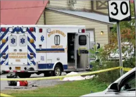  ?? TOM HEFFERNAN SR. VIA AP ?? In this Saturday photo, a body is draped under a blanket at the scene of a fatal crash in Schoharie, N.Y.