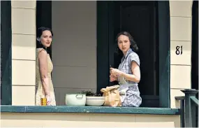  ??  ?? A LITTLE CLOSE TO HOME Winona Ryder and Zoe Kazan in The Plot Against America, adapted from Philip Roth’s 2004 novel by David Simon, left