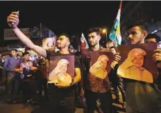  ?? Reuters ?? Demonstrat­ors gather in the streets in support of Kurdish president Masoud Barzani in Duhok, Iraq on Sunday.