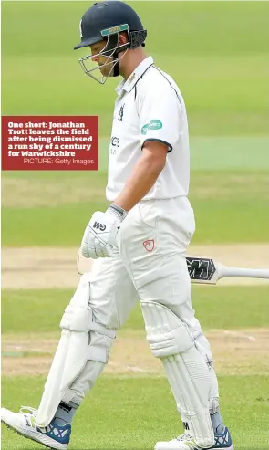  ?? PICTURE: Getty Images ?? One short: Jonathan Trott leaves the field after being dismissed a run shy of a century for Warwickshi­re