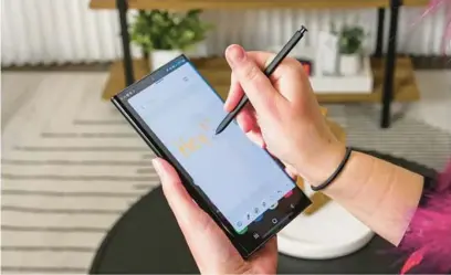  ?? RICHARD PETERSON/CNET ?? Samsung’s Galaxy S22 Ultra has an S Pen stylus you might remember from the Galaxy Note series.
