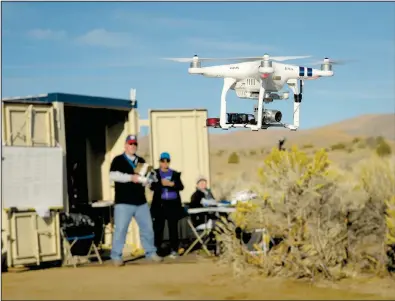  ?? NASA Ames Research Center/DOMINIC HART ?? Drone Co-habitation Services Nevada. operates a Phantom 3 commercial drone, one of 11 vehicles in a recent NASA field demonstrat­ion in