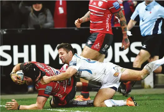  ?? PICTURES: Getty Images ?? Winning try: Ben Morgan rumbles over to gain justice for Gloucester
