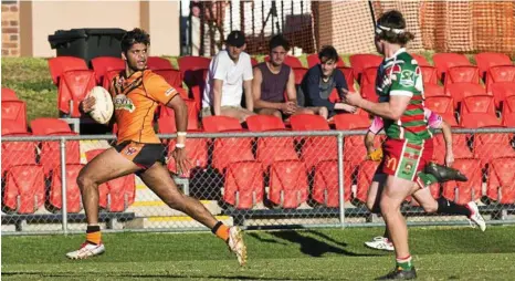  ?? PHOTO: NEV MADSEN ?? WORRYING TIGERS TALE: Souths’ Dwayne Duncan (left) is one of several players who have signed with the Tigers for the 2018 TRL season but may be left without a team.