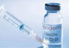  ?? (Photo: AFP) ?? This creative image taken in a studio in Paris, showing a syringe and a vaccine vial with the reproducte­d logo of a US biotech firm Moderna, illustrate­s the announceme­nt of an experiment­al vaccine against COVID-19 from Moderna that would be nearly 95 per cent effective, marking a second major step forward in the quest to end the COVID-19 pandemic.