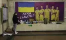  ?? Future Publishing/Getty Images ?? A poster featuring Ukrainian nationalte­am players reads “We are stronger together” in a Kyiv metro station that also serves as a bomb shelter. Photograph: