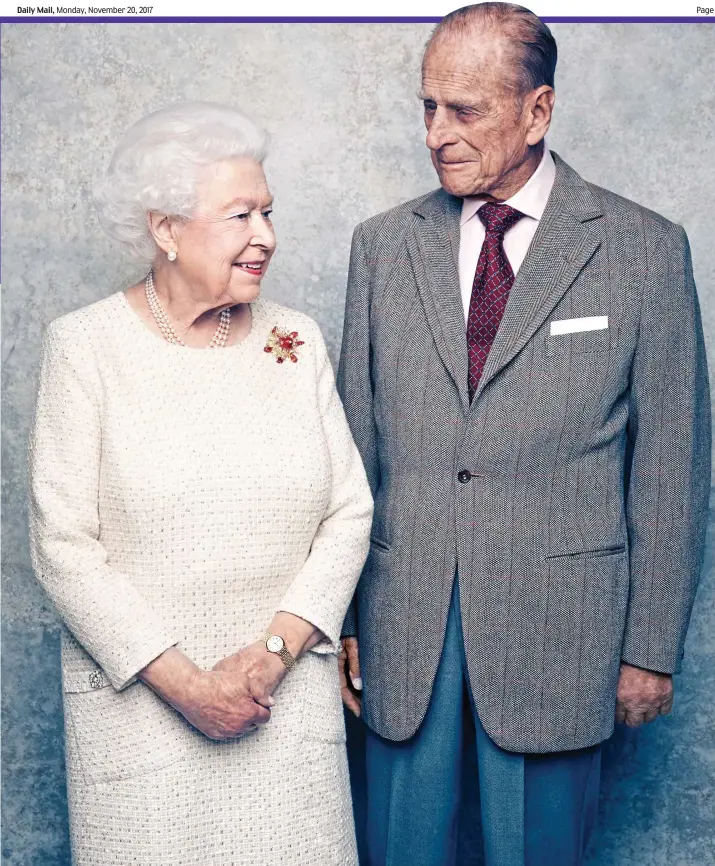  ??  ?? Still crazy for each other after all these years: A quizzical glance from Prince Philip makes the Queen smile as the devoted couple celebrate their 70th wedding anniversar­y