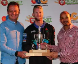  ??  ?? Gary Wagner (centre), captain of George CC, receives the trophy, for the SWD T20 League from Shael Laminie (vice-president: SWD Cricket). On the left is Albertus Kennedy (chief executive officer: SWD Cricket).