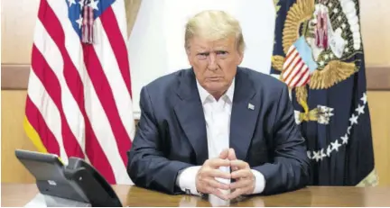  ?? (Photo: AP) ?? In this image provided by the White House, President Donald Trump listens during a phone call with Vice- President Mike Pence, Secretary of State Mike Pompeo, and Chairman of the Joint Chiefs of Staff General Mark Milley, Sunday, October 4, 2020, in his conference room at Walter Reed National Military Medical Center in Bethesda, Md. White House chief of staff Mark Meadows was also in the room, but not pictured, according to the White House.