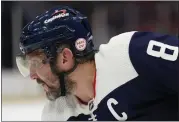  ?? PATRICK SEMANSKY — THE ASSOCIATED PRESS ?? Capitals left wing Alex Ovechkin wears a helmet bearing a sticker in memory of his father, Mikhail Ovechkin, on Thursday night against the Ducks in Washington.