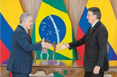 ?? EFE ?? Jair Bolsonaro recibió con honores de Estado a su homólogo colombiano, Iván Duque