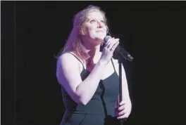  ?? ?? Gwen Coburn mixes standup with a serious personal story in “Sad Girl Songs: A Comedy Show.”