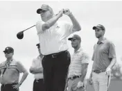  ?? SETH WENIG AP ?? Former President Donald Trump tees off during the pro-am round of the Bedminster Invitation­al LIV Golf tournament on Thursday.