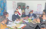  ?? HT PHOTO ?? A returning officer busy in scrutiny of nomination papers in Prayagraj on Wednesday.