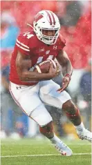  ?? JEFF HANISCH / USA TODAY SPORTS ?? Badgers running back Nakia Watson is averaging 9.6 carries a game.