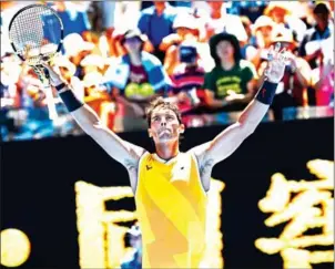  ?? JEWEL SAMAD/AFP ?? Spain’s Rafael Nadal celebrates his victory against Australia’s James Duckworth on day one of the Australian Open in Melbourne on Monday.
