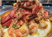  ?? Thirteen ?? Former Rockets star James Harden’s Thirteen serves smoked gouda grits topped with Cajun seafood boil.