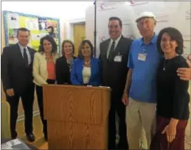  ?? PEG DEGRASSA — DIGITAL FIRST MEDIA ?? Local officials from Ridley Township, Ridley Park and Glenolden attend the recent Senior Community Services gathering at Schoolhous­e Center in Folsom to mark the fifth anniversar­y of the Aging At Home program. At the celebratio­n are, left to right, Ridley Township Commission­ers Thomas Donahue, Patricia Hollabaugh, Nancy Robert, Betsy Cummins and Patrick McMenamin; Ridley Park Mayor Hank Eberle; and Senior Community Services Aging At Home Director Christine Helmandoll­ar.