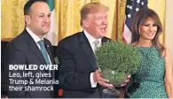  ??  ?? BOWLED OVER Leo, left, gives Trump & Melania their shamrock