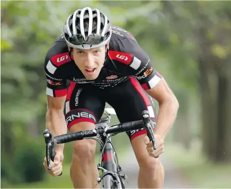  ?? JULIE OLIVER/OTTAWA CITIZEN ?? Mike Woods, a former track and field standout who quit the sport because of recurring injuries, has shifted to cycling and is again making his way to toplevel competitio­n.