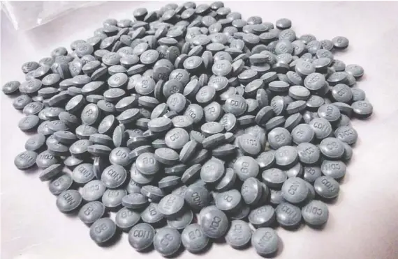  ?? THE CANADIAN PRESS/ALBERTA LAW ENFORCEMEN­T RESPONSE TEAMS ?? Fentanyl pills and other opioids have taken 458 lives so far in 2019.