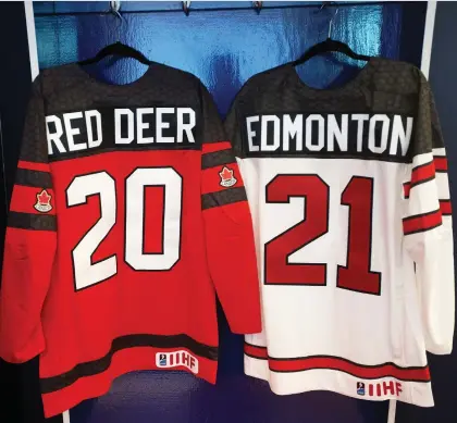  ?? DAVID BLOOM ?? Team Canada jerseys hang at Rogers Place for Thursday’s announceme­nt that Red Deer and Edmonton will co-host the 2021 world juniors.
