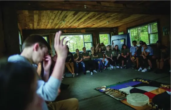  ?? JESSE WINTER PHOTOS/TORONTO STAR ?? “How many of you know someone who died by suicide?” George Couchie asks a room full of Indigenous youth during the first day of the Niigan Mosewak culture camp in Trout Creek, Ont.