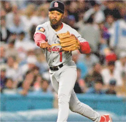  ?? MARKJ. TERRILL/ASSOCIATED PRESS FILE ?? In June 1994, Ozzie Smith of St. Louis throws out a Dodger in Los Angeles. Considered the finest-fielding shortstop ever, the first-ballot Hall of Famer has spoken eloquently about how the Cooperstow­n shrine should represent baseball history.