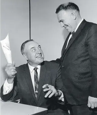  ?? A D R I A N L U N N Y/ MO N T R E A L G A Z E T T E F I L E S ?? The Canadiens’ gruff but massively successful coach Toe Blake, left, with then- general manager Sam Pollock in 1966 after signing a new one- year contract to coach the Habs.