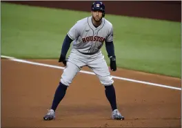  ?? TONY GUTIERREZ — THE ASSOCIATED PRESS FILE ?? The Houston Astros’ George Springer takes a lead off first during the first inning Sept. 25against the Texas Rangers in Arlington, Texas.