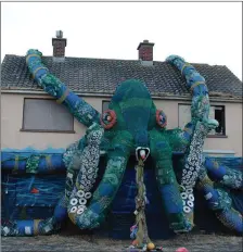  ??  ?? 10m high Octopus made entirely from reclaimed & recycled marine waste, on display in Clogherhea­d.
