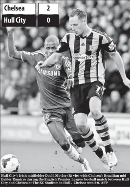  ??  ?? Hull City's Irish midfielder David Meyler (R) vies with Chelsea's Brazilian midfielder Ramires during the English Premier League football match between Hull City and Chelsea at The KC Stadium in Hull . Chelsea won 2-0. AFP