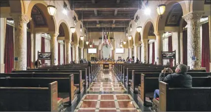  ?? Irfan Khan Los Angeles Times ?? THE HORSESHOE seating in the Los Angeles City Council chamber would need to be renovated if the council were expanded.