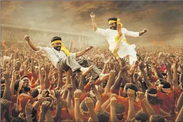  ?? DVV Entertainm­ent ?? “RRR’s” revolution­aries Alluri Sitarama Raju (Ram Charan), left, and Komaram Bheem (N.T. Rama Rao Jr.).