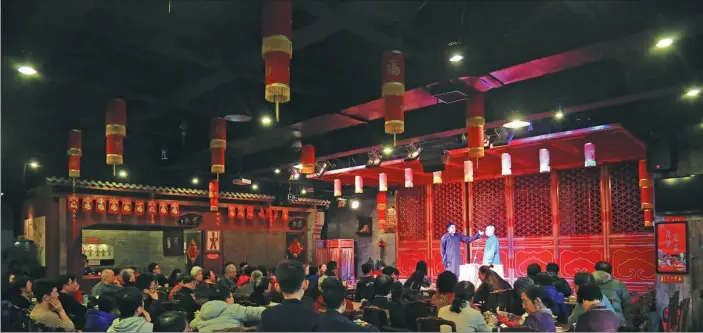  ?? BY LIU XUAN / CHINA DAILY ?? Laoshe Teahouse attracts customers of different ages. Teahouses have become popular again in recent years after seeing their business decline with the arrival of Western cultural influences.