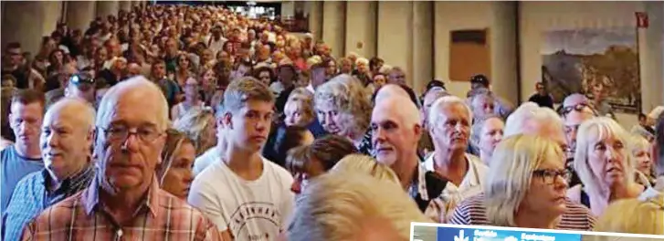  ??  ?? Shuffling at a snail’s pace: Passengers queue at Palma airport on July 14 as staff struggle to cope