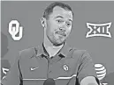  ?? AP Photo/Sue Ogrocki ?? n Oklahoma head coach Lincoln Riley listens to a question Monday during a news conference in Norman, Okla.