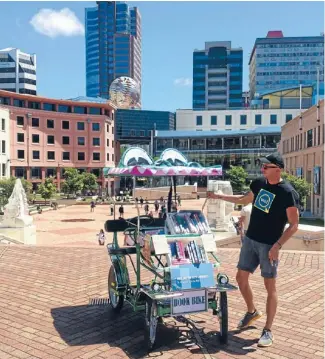  ??  ?? Branch 13: Simon Christians­en with Book Bike, the newest edition to the City Libraries’ branches.