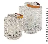  ?? SERENA AND LILY. ?? The Whitewashe­d Rattan Hurricane (US$118US$148, serenaandl­ily.com). The lanterns can be hung by their leather handles from outdoor ceilings and moved inside in the fall.